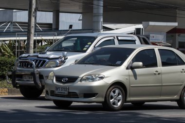 Chiangmai, Thailand -   June  1 2023: Private Sedan car Toyota Vios. On road no.1001 8 km from Chiangmai Business Area.