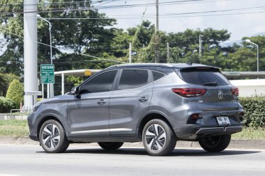 Chiangmai, Thailand -   February 28 2023: Private Suv Car MG VS HEV. Product from British automotive. On road no.1001, 8 km from Chiangmai city.