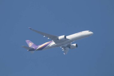 Chiangmai, Thailand -  January 18 2024:   HS-THC Airbus A350-900 of Thaiairway TG105. Take off from Chiangmai airport to Bangkok. clipart