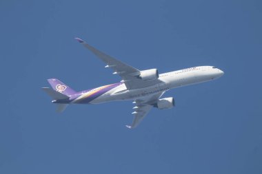 Chiangmai, Thailand -  January 18 2024:   HS-THC Airbus A350-900 of Thaiairway TG105. Take off from Chiangmai airport to Bangkok. clipart