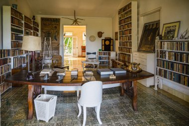 Ernest Hemingways home in Cuba is preserved as if he was still living there. High quality photo clipart