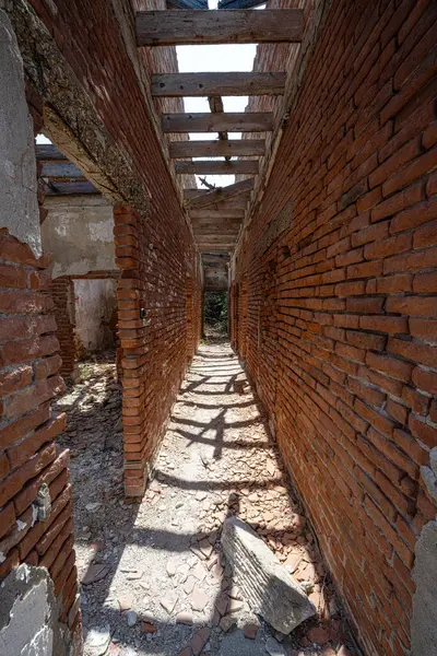 stock image Abandoned house with traces of devastation and rot. Missing roof, grafitti etc. High quality photo