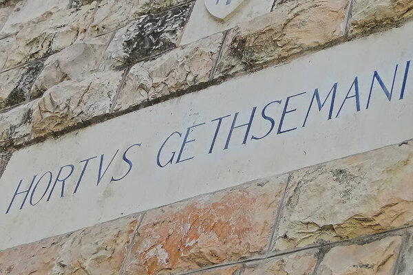 Inscription on the wall in Latin, Garden of Gethsemane, in front of the entrance to the historical site, Jerusalem, Israel