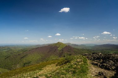 View of Polonina Carynska and Wetlinska with Chatka Puchatka and Trekking Tourists clipart