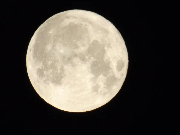 stock image Genova, Italy-July 14, 2022: Beautifull full moon. Summer super moon with dark background behind. Moon detail in summer days.