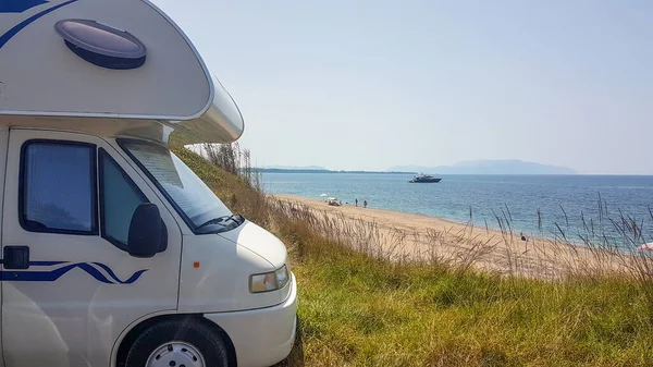 caravan car by the sea yatch beach summer holidays blue colors