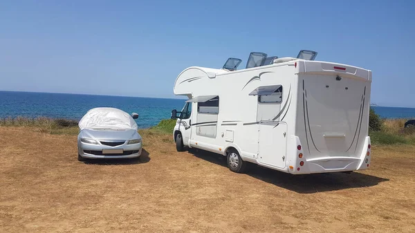 caravan car by the sea in summer season hot  morning beach travel in holidays