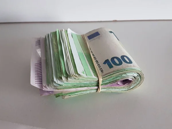 stock image money banknotes euro 100 isolated on a white table market backgrond loan debt