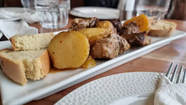 meat  potatoes bread  sauce food greek cuisine