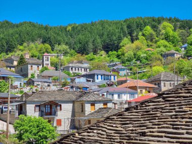 skamneli village greee, ioannina perfecture old traditional style roofs clipart