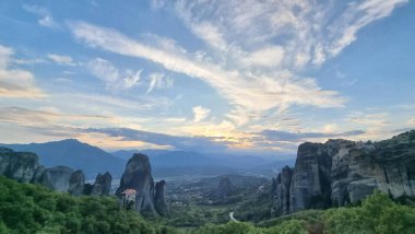 meteora churches in kalampaka city greece sunset time clouds colors sunset clipart