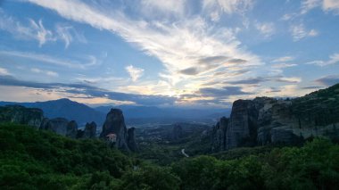 meteora churches in kalampaka city greece sunset time clouds colors sunset clipart