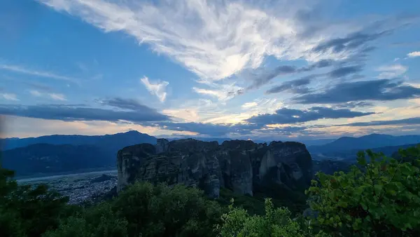 stock image meteora churches in kalampaka city greece sunset time clouds colors sunset