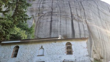 meteora churches and rocks view from kastraki village in auutmn season clipart