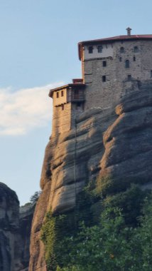 meteora churches and rocks view from kastraki village in auutmn season clipart