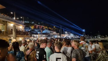 parga city in the nighto of 15 august in celebration greek tourist resort in summer clipart