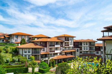 Red tiled roofs of luxury villas and the patio of the hotel cascade complex in the resort village of Sveti Vlas in Bulgaria. High quality photo