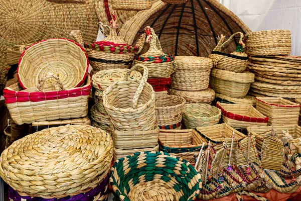 Handmade baskets from plants fiber at craft market in Otavalo, province Imbabura, Ecuador