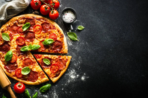 Pizza Salami Cheese Tomatoes Basil Black Table Top View Copy — Fotografia de Stock