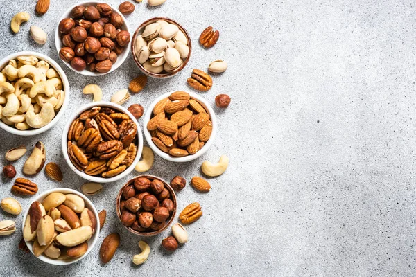 Assortment Nuts Bowls Cashew Hazelnuts Pecan Almonds Brazilian Nuts Pistachios — Stock Photo, Image