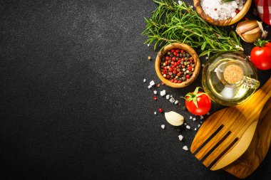 Ingredients for cooking. Food background. Top view on black background.