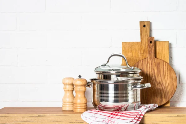 Kitchen Table Kitchen Utensils Cooking Pots Oil Bottle Wooden Cutting — Fotografia de Stock