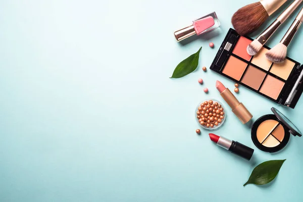 Make Professional Cosmetics Blue Background Powder Lipstick Shadow Brushes Green — Stock Photo, Image