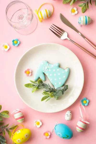 Easter food background. Easter table setting. Flat lay on blue, vertical format
