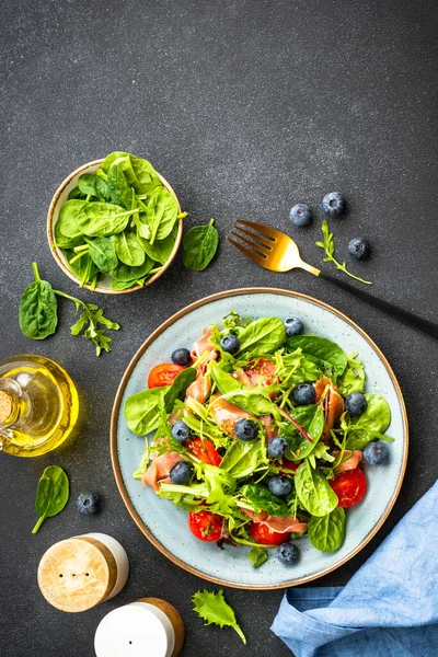 Healthy Salad Prosciutto Green Leaves Mix Tomatoes Dark Background Top — Stock Photo, Image
