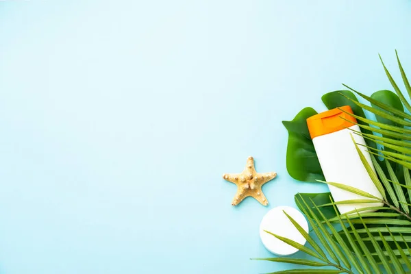 stock image Sun screen products on tropical background. Sun protection. Flat lay image with space for text.