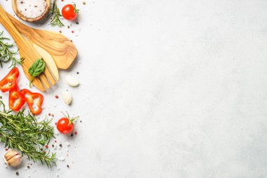 Ingredients for cooking. Food background with herbs and vegetables. Top view on white background.