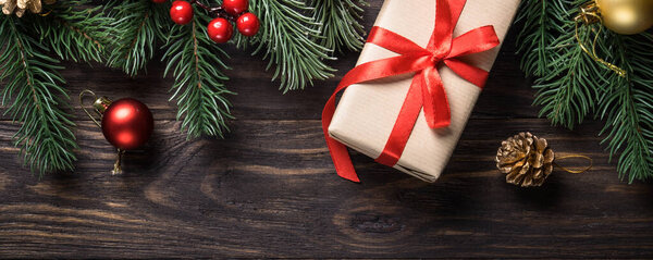 Christmas background. Christmas present and holiday decorations. Long banner format.