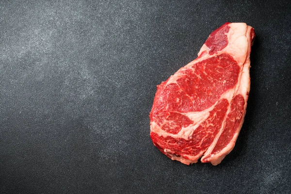 Rindersteak Ribeye Steak Rohes Fleisch Auf Schwarz Draufsicht Mit Kopierraum — Stockfoto