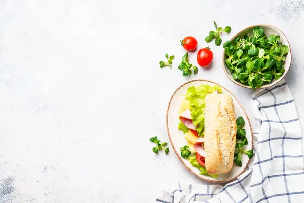 Ciabatta Sandwich Lettuce Cheese Tomatoes Ham Flat Lay White Table — Stock Photo, Image