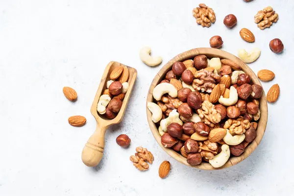 Nuts Assortment White Background Almond Hazelnut Cashew Wooden Bowl Top — Stock Photo, Image