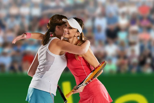 Happy Female Professional Tennis Players Hugging Competition — Zdjęcie stockowe