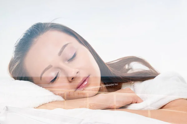 Sleeping young beauty girl with light background, double multiple exposure effect,combined images