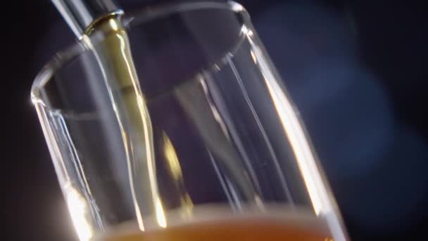 Pouring Cold Craft Light Beer Bubbles Glass Bottle Detail Shot — Stock Video