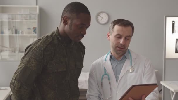 Medium Slowmo Black Military Officer Uniform Listening Caucasian Radiologist White — Wideo stockowe