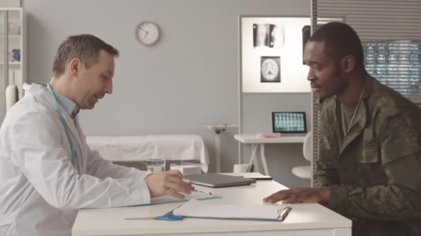 Medium Slowmo Black Military Officer Visiting Radiologist Modern Clinic Checkup — Wideo stockowe
