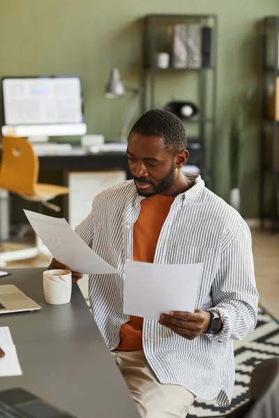 Vertical Portrait Modern Black Businessman Working Home Office Analyzing Documents — Stock fotografie
