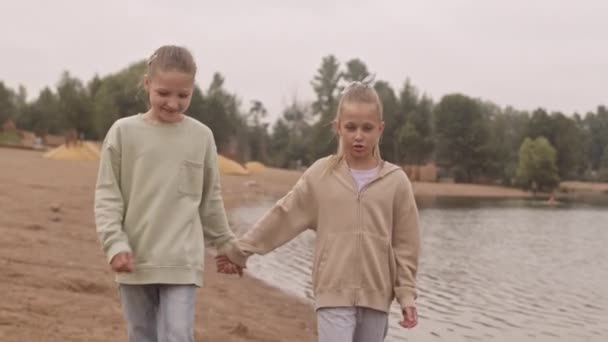 Slowmo Two Mischievous Pretty Year Old Girls Walking Camera Sandy — Stock Video