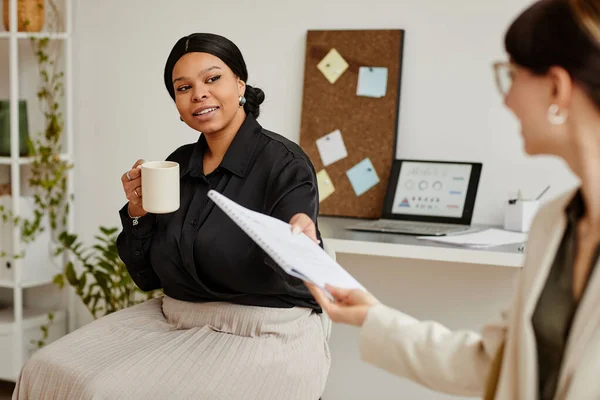 Portrait Two Successful Businesswomen Discussing Documents Minimal Office — Stock Photo, Image
