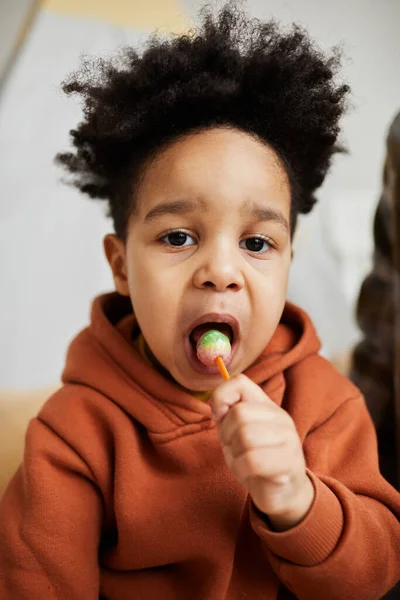 Vertical Close Portrait Cute Toddler Boy Holding Lollipop Looking Camera — Stock Photo, Image