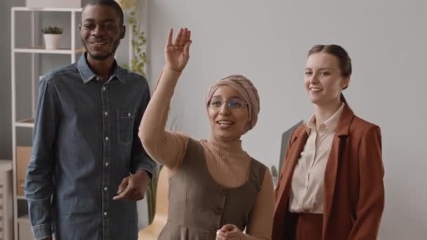 Medium Slowmo Cheerful Multiethnic Team Colleagues Having Fun Office Throwing — Stock Video