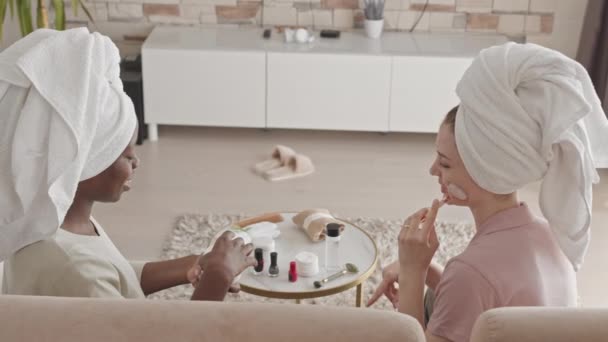 Medium Slowmo Two Young Beautiful Multiethnic Women Towels Heads Chatting — Stock Video