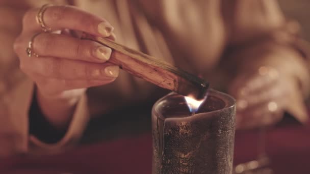 Slowmo Closeup Fortune Teller Using Wax Candle Burn Palo Santo — Stock Video