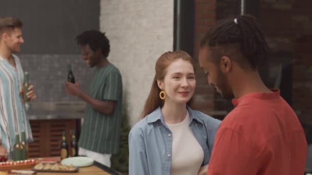 Medium Slowmo Happy Redhead Girl Greeting African American Male Friend — Stock Video
