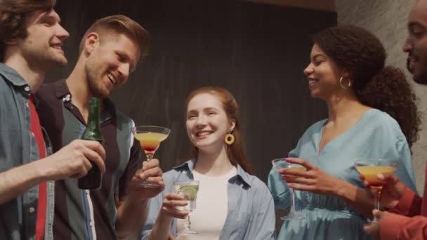 Medium Slowmo Five Young Cheerful Diverse Lgbtq Friends Chatting Drinking — Stock Video