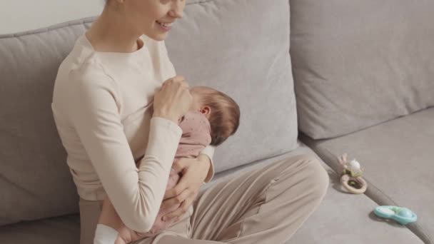 Slowmo Young Caucasian Woman Infant Baby Daughter Her Arms Sitting — Videoclip de stoc
